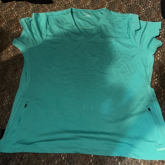 BNWT Jaanuu Scrub Top - Picture 1 of 3